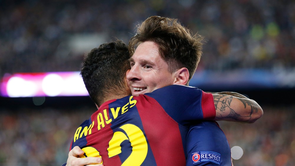 Dani Alves i Lionel Mesi (©Reuters)